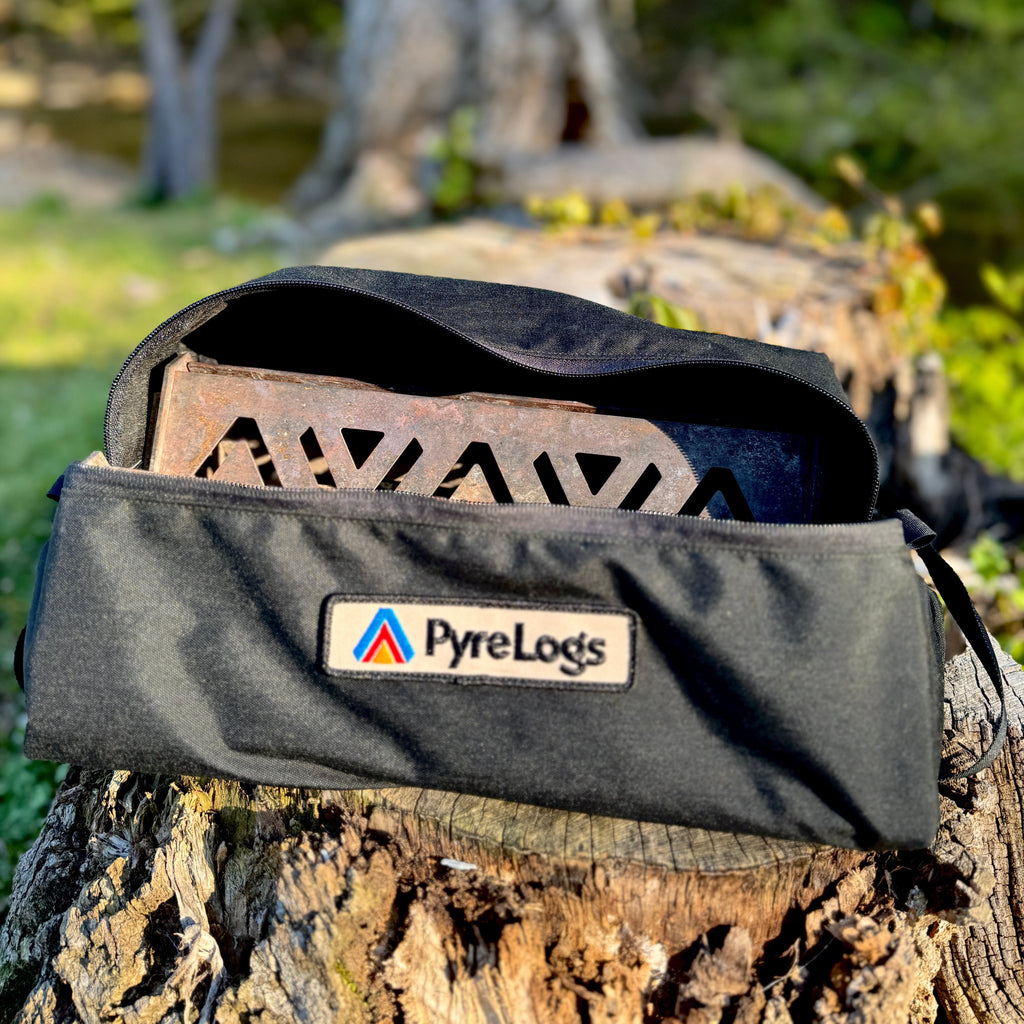 Black carrying case with PyreLogs logo on a tree stump in a natural setting